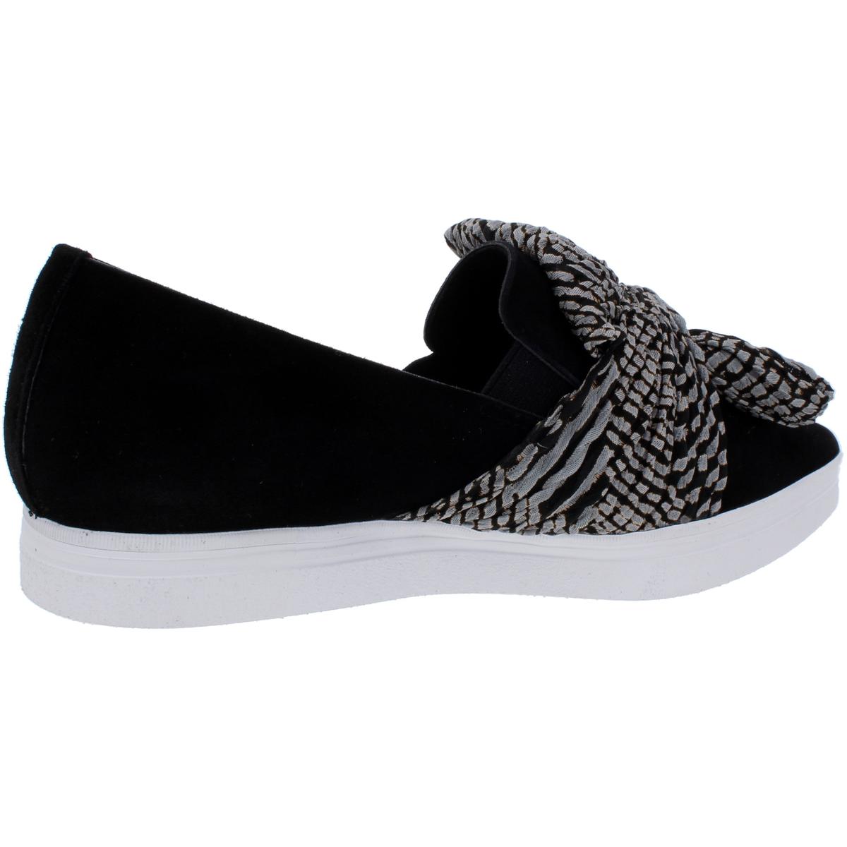 black trainers with bow