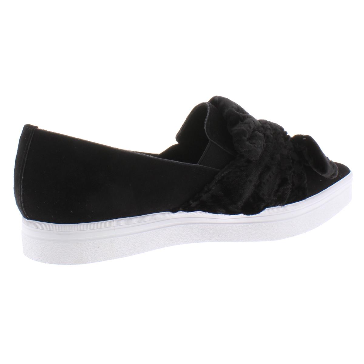 black trainers with bow